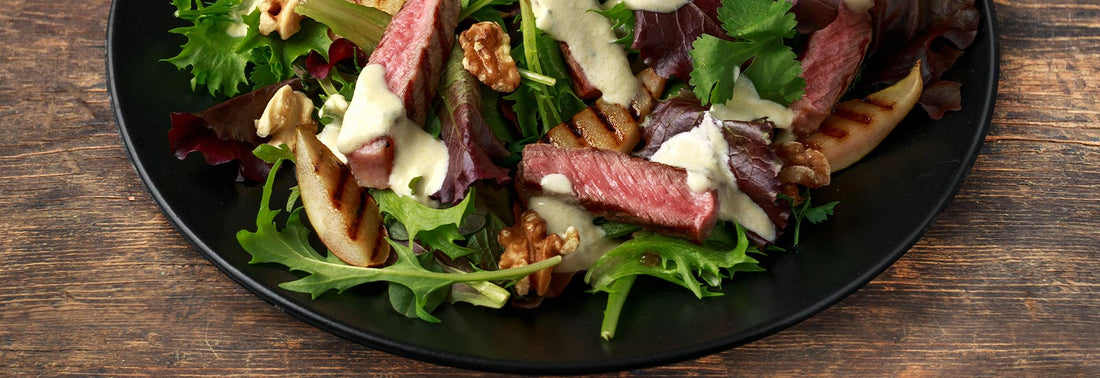 GRILLED BEEF RIBEYE & PEAR SPRING SALAD WITH BLEU CHEESE DRESSING