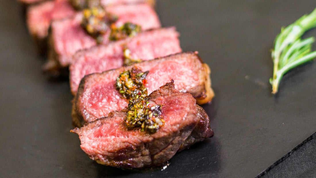 Chargrilled Bison NY strip with Black Garlic Chimichurri