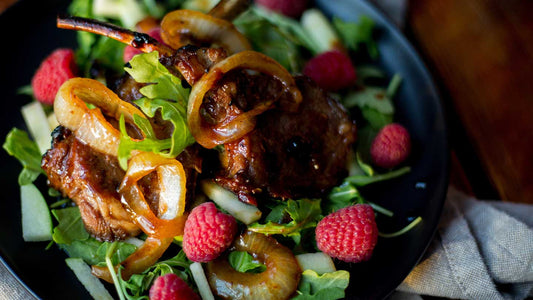 CHIPOTLE-GLAZED VENISON TOMAHAWK SALAD