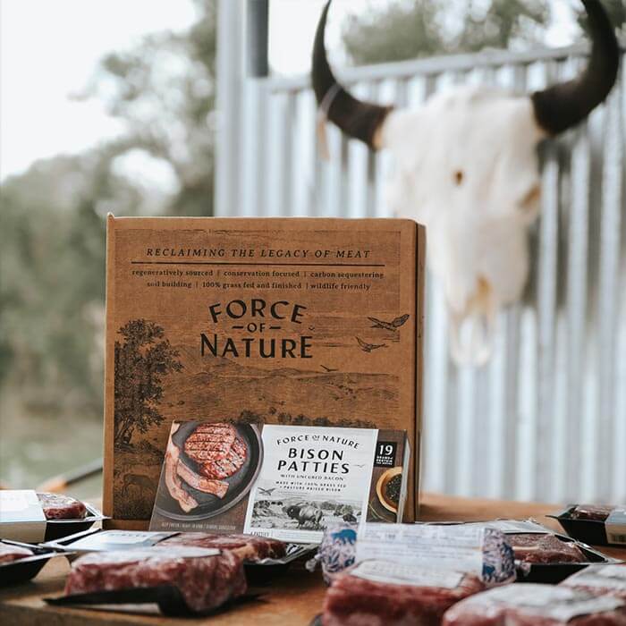 Force of Nature Bison Box with packaged meats on a table.
