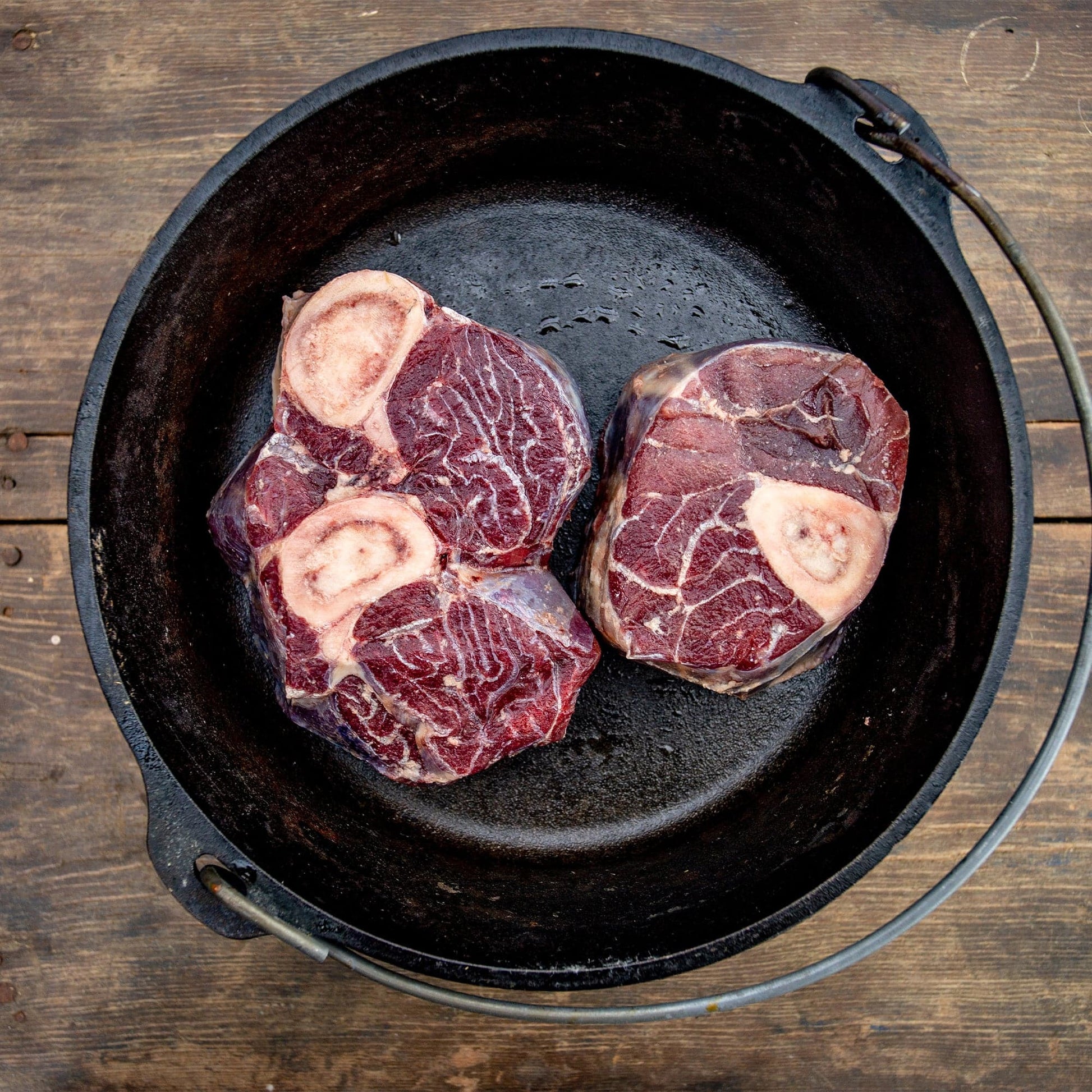 Bison Osso Buco in a pan.