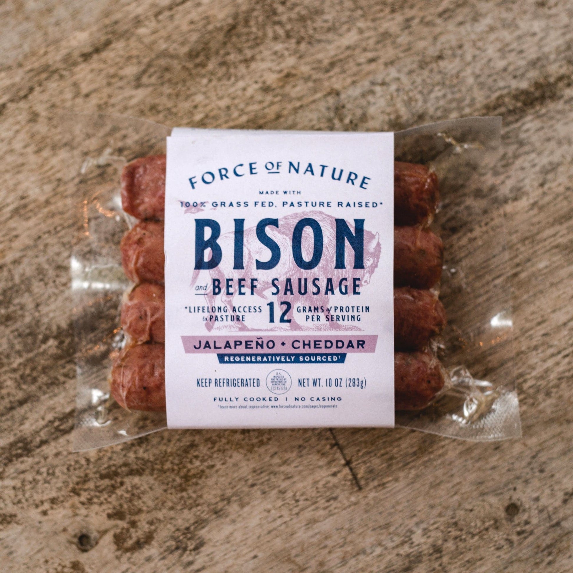 Bison & Beef sausage package on a wooden table.